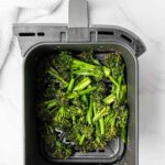 broccolini in air fryer basket