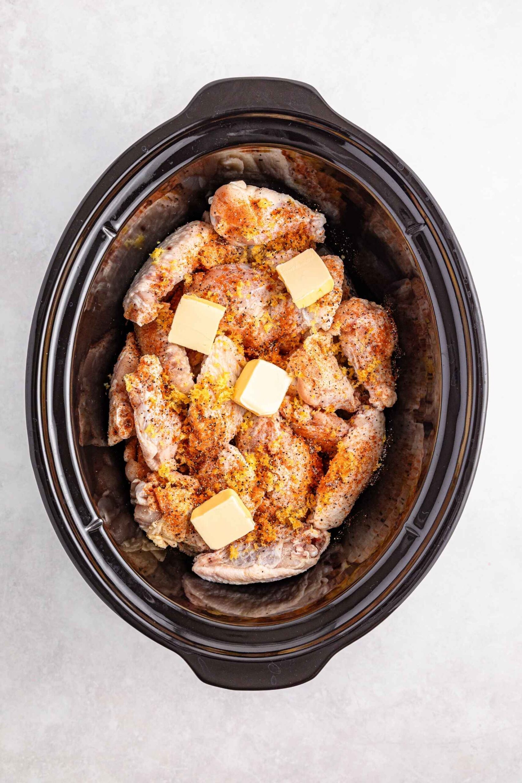wings in crockpot bowl