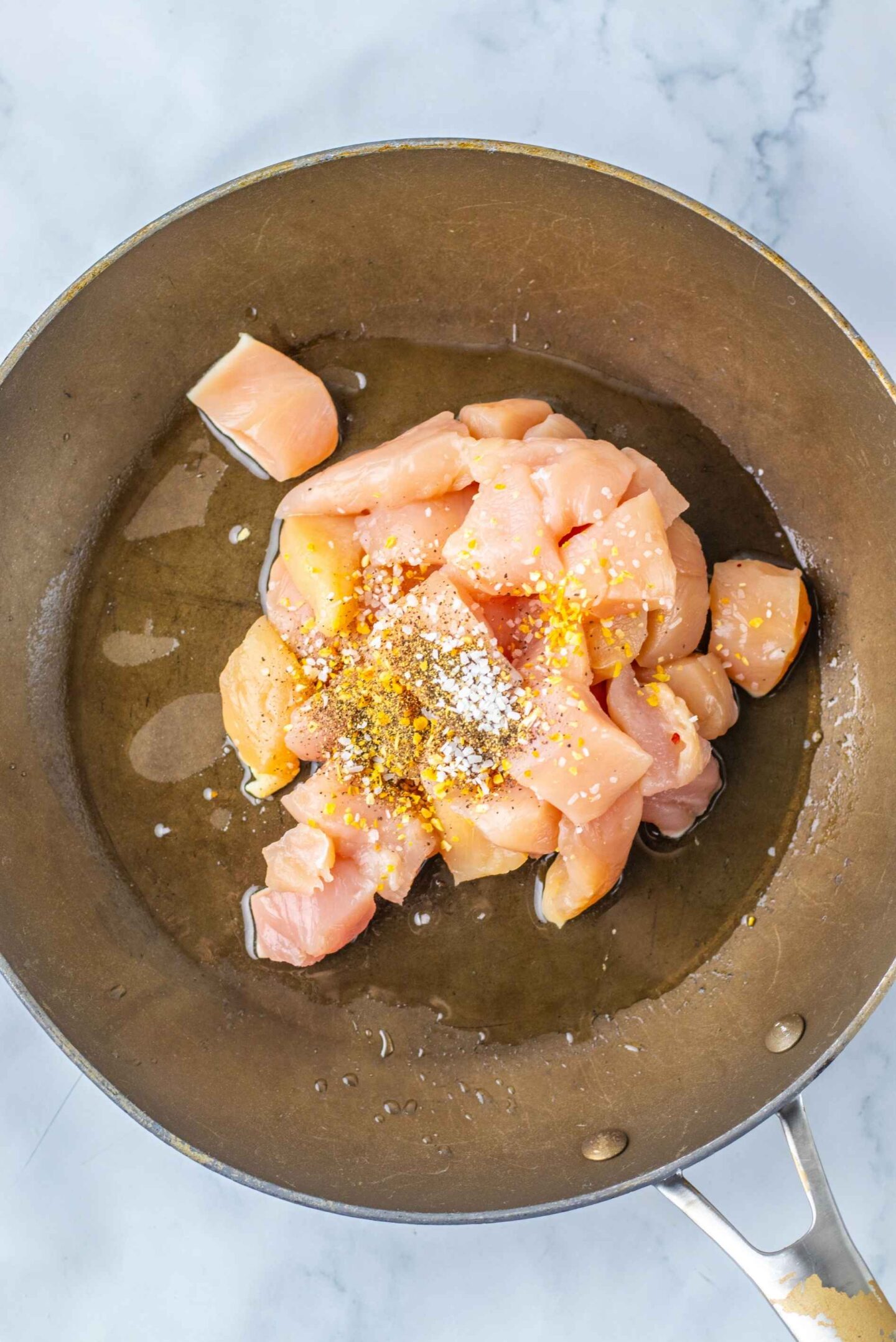 chicken in pan for fried rice