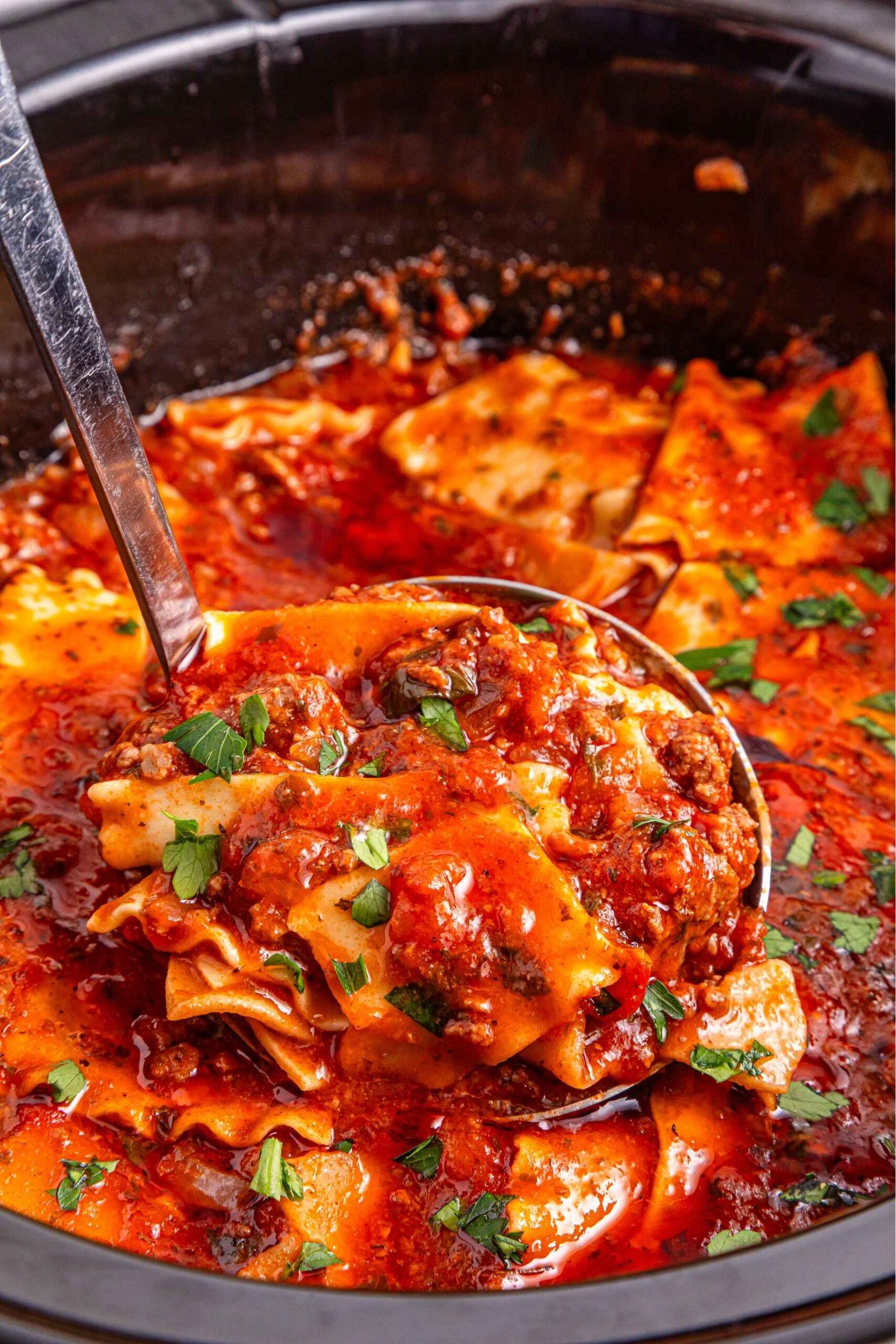 crockpot lasagna soup with ladle