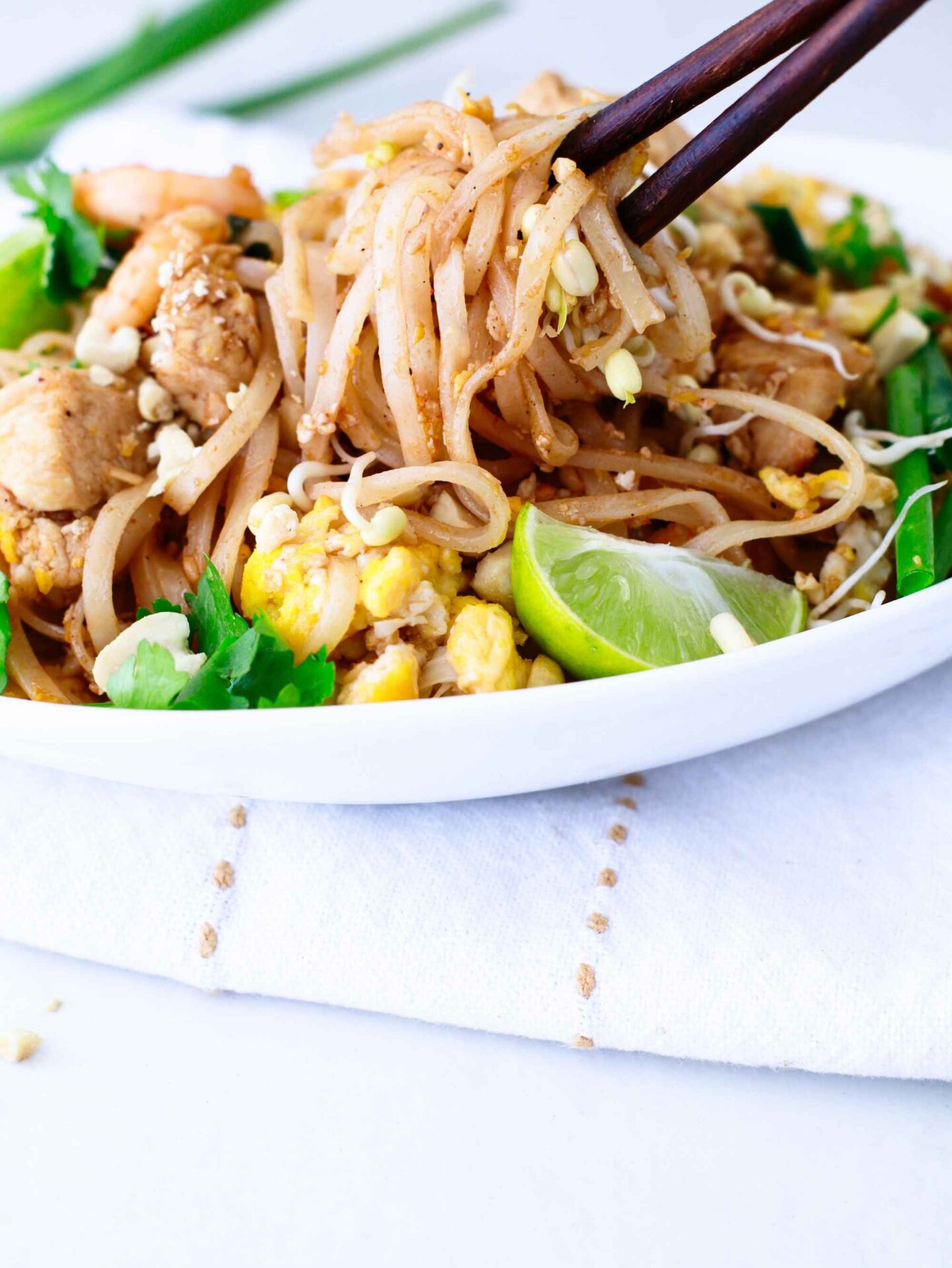 pad thai on chopsticks