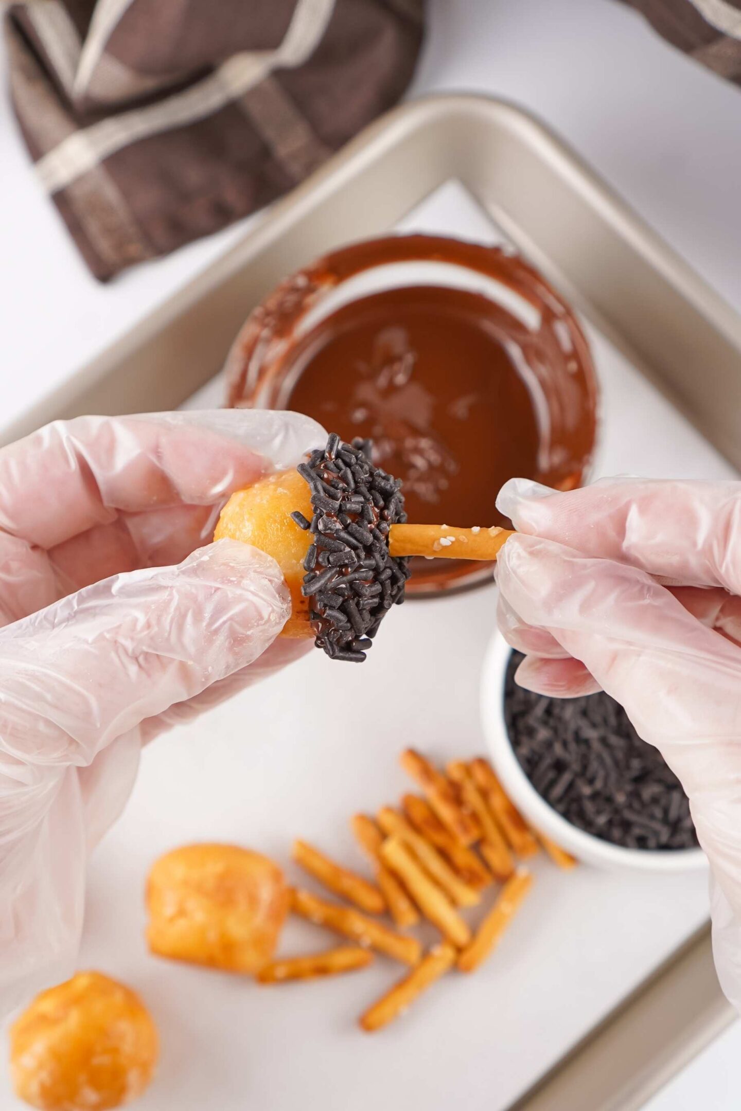 acorn donut holes with pretzel sticks