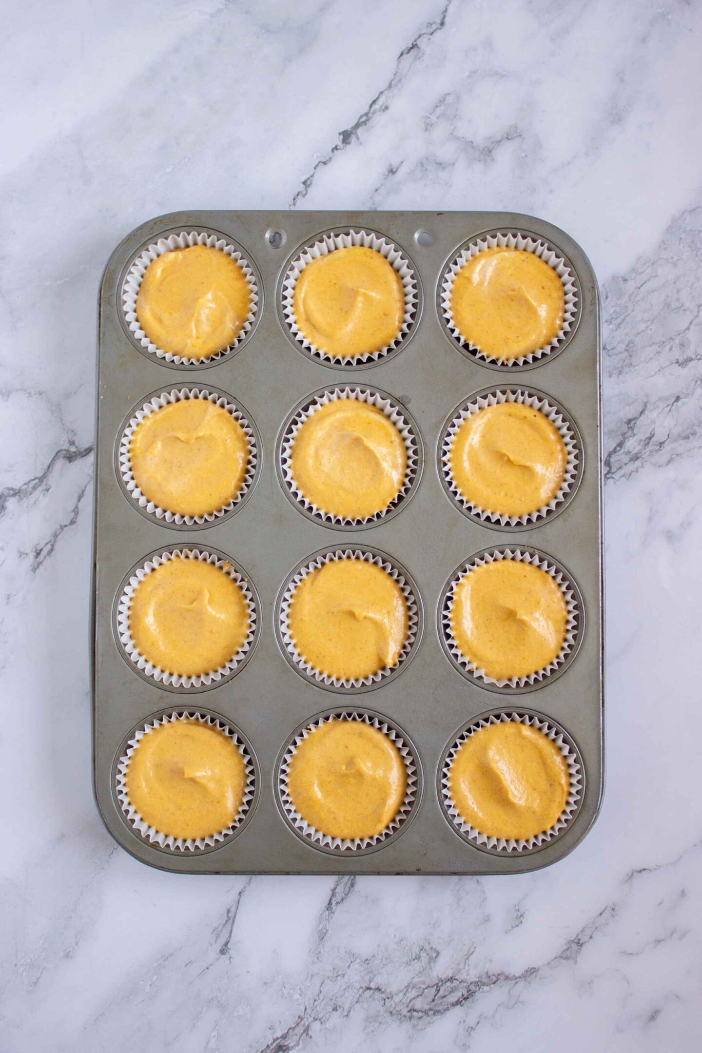 mini pumpkin cheesecakes in tray
