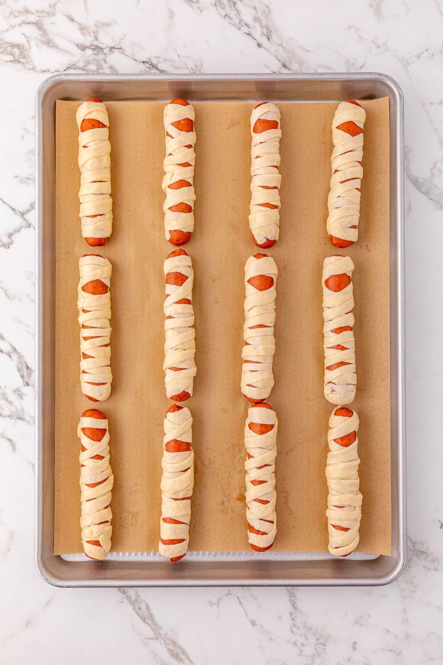 pre baking hot dog mummies