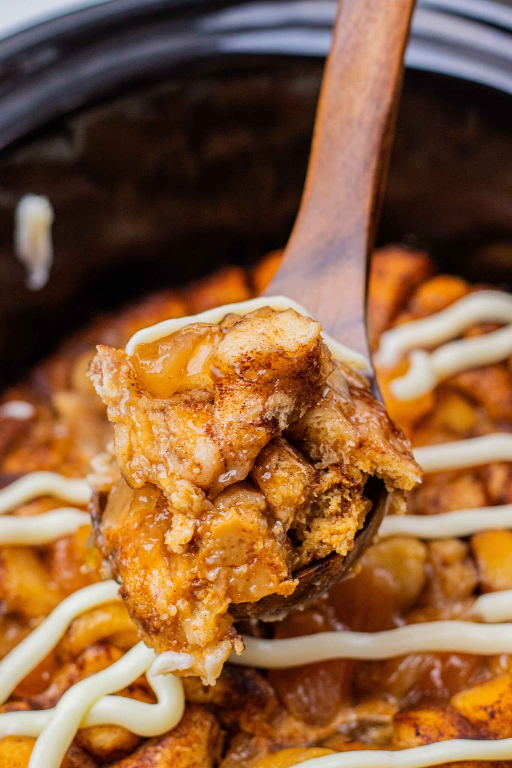 cinnamon roll casserole on spoon