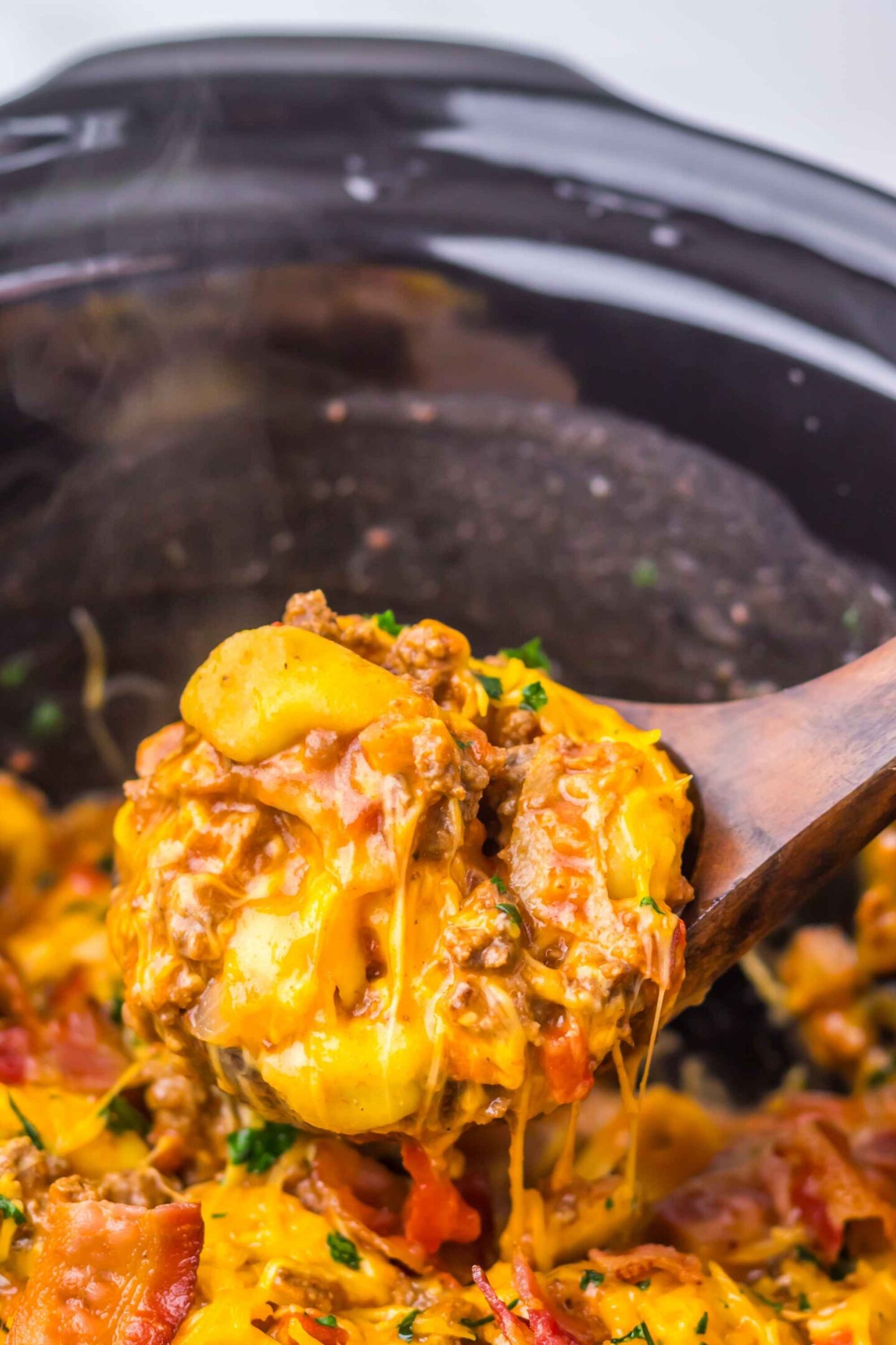 cheeseburger tortellini on spoon